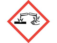 Symbol for Corrosive in red triangle