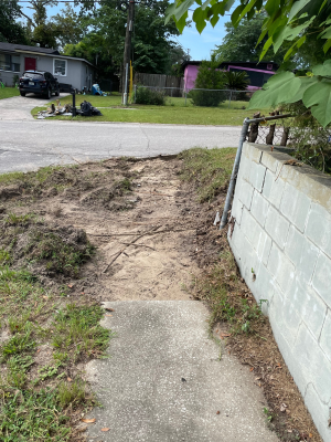 A sidewalk in the removal process