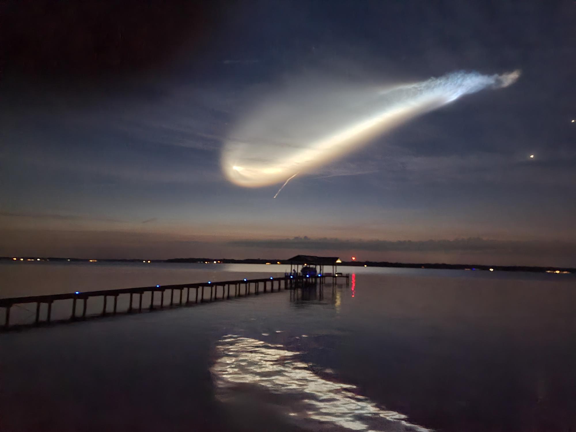 Photo of the St. Johns winner with a SpaceX rocket in the sky