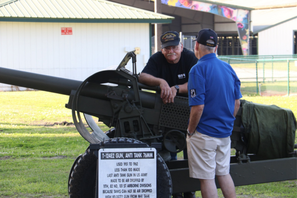 two military veterans talking at a game